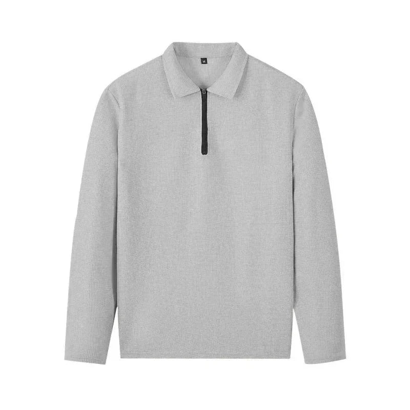 Suéter gris de manga larga para hombre con cremallera corta y cuello tipo polo
