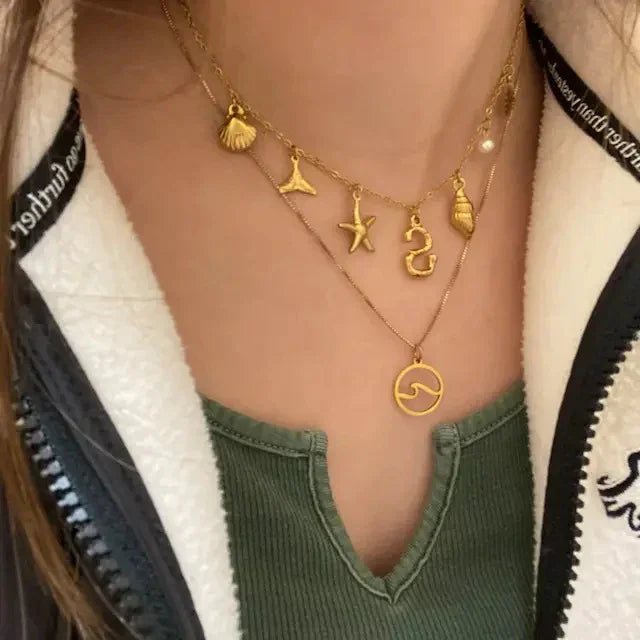 Garrucha Collar de Perlas