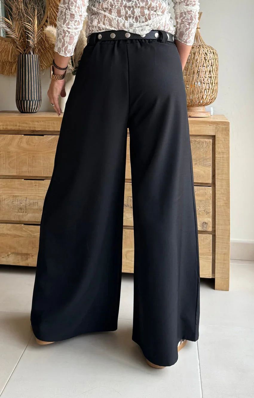 Pantalón negro de pierna ancha para mujer con cinturón de tachuelas, estilo moderno