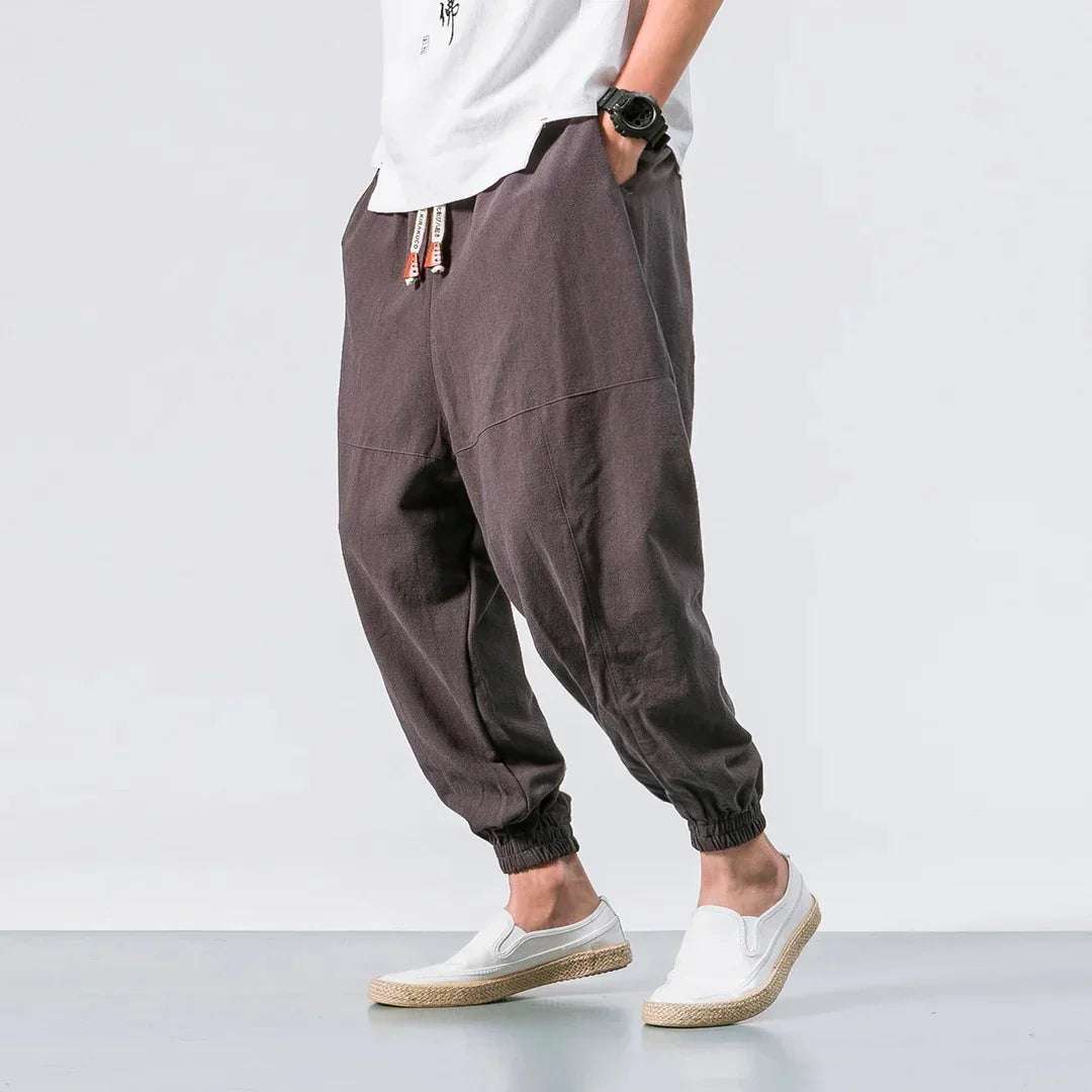 Pantalones holgados color marrón para hombre, estilo casual, con puño y cordón ajustable